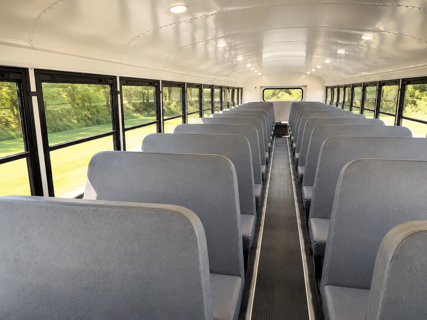 school buses for plymouth sports team travel and athletic field trips